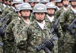 Japan discloses revised military plans