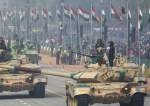 Soldiers on T-90 (Bhisma) tanks march along the Rajpath during the full dress rehearsal for the upcoming Republic Day Parade in New Delhi.