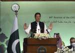 Pakistani Prime Minister Imran Khan speaks at a meeting for the Organization of Islamic Cooperation, at the Parliament House in Islamabad, Pakistan, March 22, 2022.