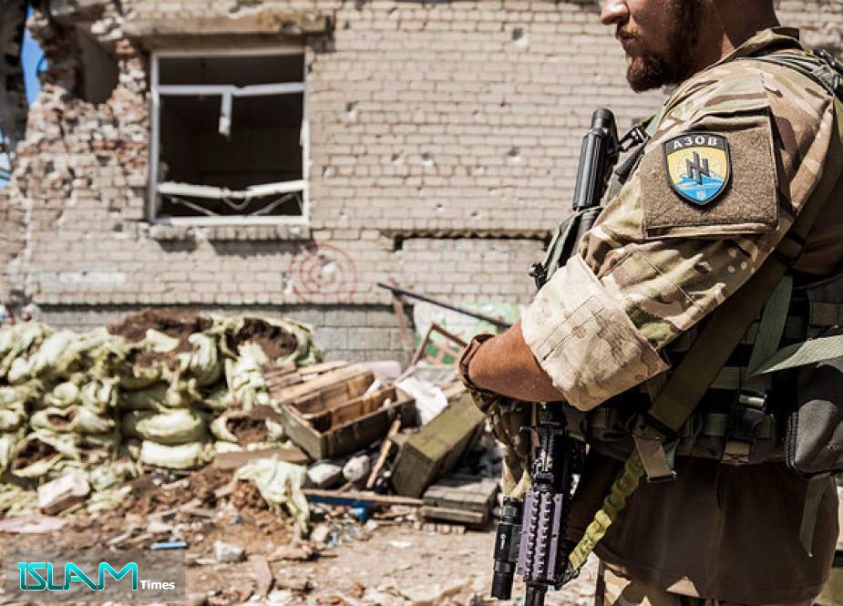 An Azov Battalion fighter is shown patrolling in the Donbass region of Ukraine in July 2015.