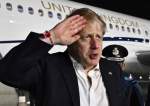 British Prime Minister Boris Johnson giving a military salute.