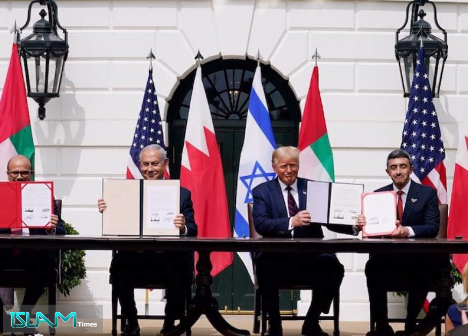 Bahraini Foreign Minister Abdullatif al-Zayani, then Israeli Prime Minister Benjamin Netanyahu, then US president Donald Trump and United Arab Emirates Foreign Minister Abdullah bin Zayed Al Nahyan sit during the so-called Abraham Accords signing ceremony at the White House, Washington, the United States, on September 15, 2020.