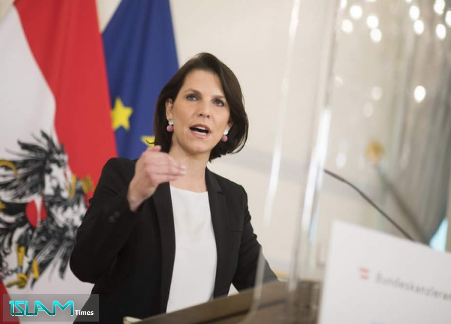 Karoline Edtstadler presents a bill for a planned compulsory vaccination at a press conference in Vienna, Austria, January 16, 2021.