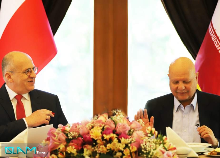 Photo shows President of Iran’s Plan and Budget Organization Masoud Mirkazemi (R) in a meeting in Tehran with Polish Foreign Minister Zbigniew Rau on May 9, 2022.