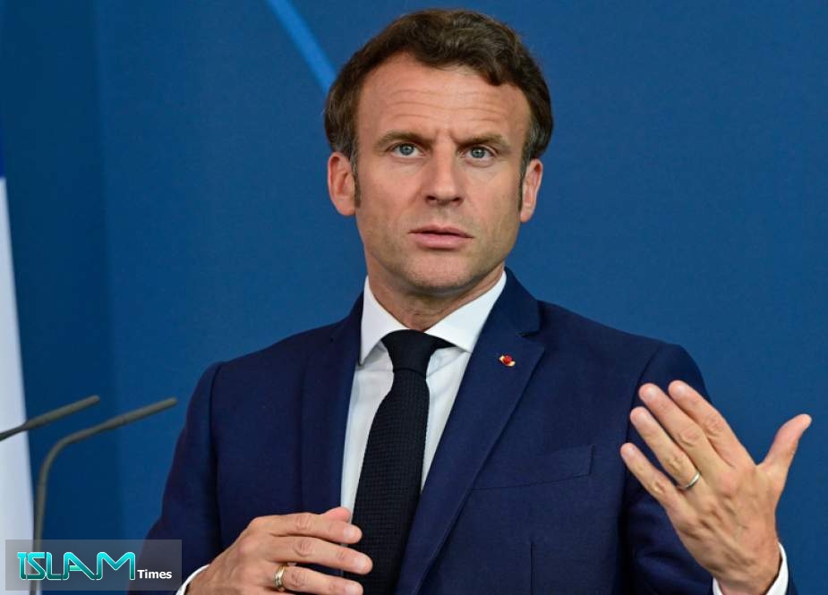 French President Emmanuel Macron addresses a press conference with the German Chancellor at the Chancellery in Berlin on May 9, 2022.