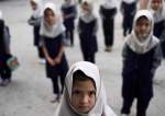 Afghan girls look on at a school in Kabul, Afghanistan, September 18, 2021.