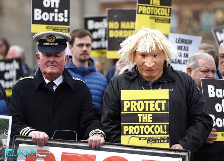 A protester dressed as British Prime Minister Boris Johnson outside Hillsborough Castle in Northern Ireland, May 2022.