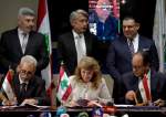 Director-General of the Syrian General Petroleum Corporation Nabih Khrestin (seated L), Director-General of Oil Facilities at Lebanese Energy Ministry Aurore Feghali (C) and the Chairperson of the Egyptian Natural Gas Holding Company (EGAS) Magdy Galal at a signing ceremony, as the World Bank
