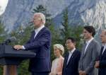 US President Joe Biden speaks next to leaders of the G7 nations at Elmau Castle, southern Germany on June 26, 2022.