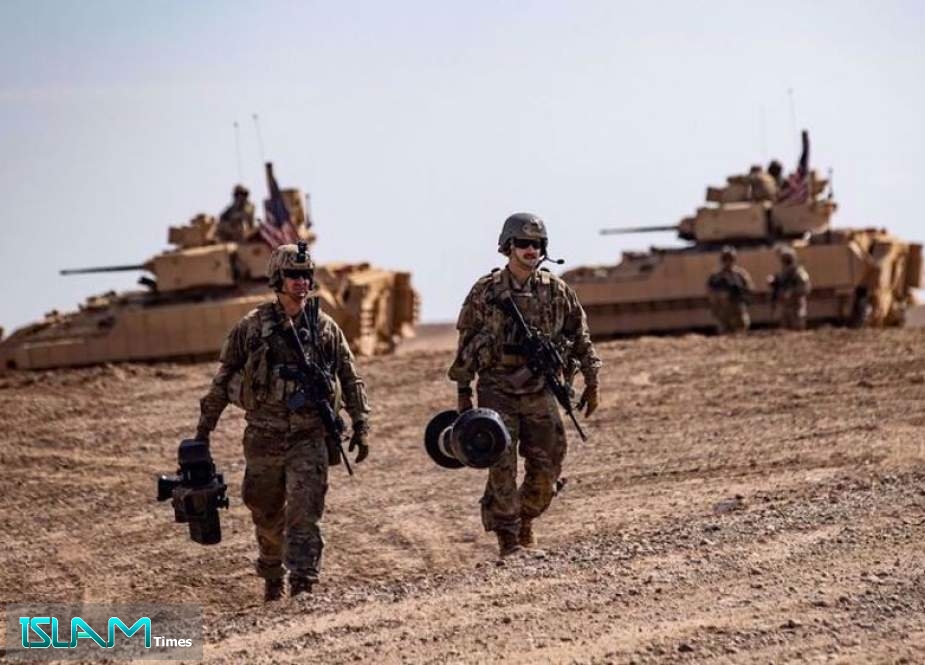 Troops from the so-called Syrian Democratic Forces (SDF) Special Operations and the US-led coalition take part in heavy-weaponry military exercises in the countryside of Dayr al-Zawr in northeastern Syria, on March 25, 2022.