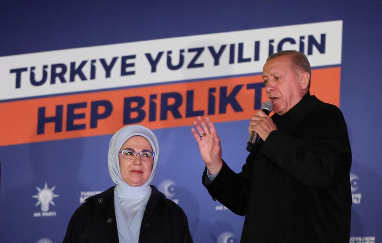 Turkish President Tayyip Erdogan, accompanied by his wife Ermine Erdogan, speaks at the AK Party headquarters in Ankara, Turkey May 15.