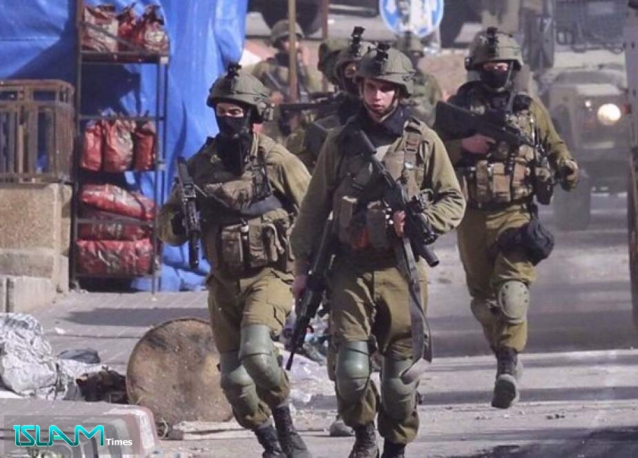 Zionist Forces Shoot Palestinian Photo Journalist in Head