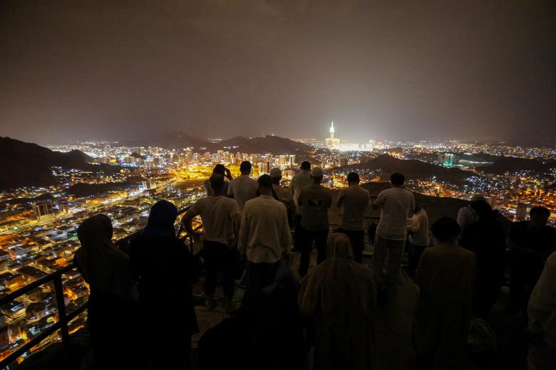 Muslim pilgrims visit Mount Al-Noor, where Muslims believe Prophet Mohammad received the first words of the Koran through Gabriel in the Hira cave, in the holy city of Mecca, Saudi Arabia, June 24.