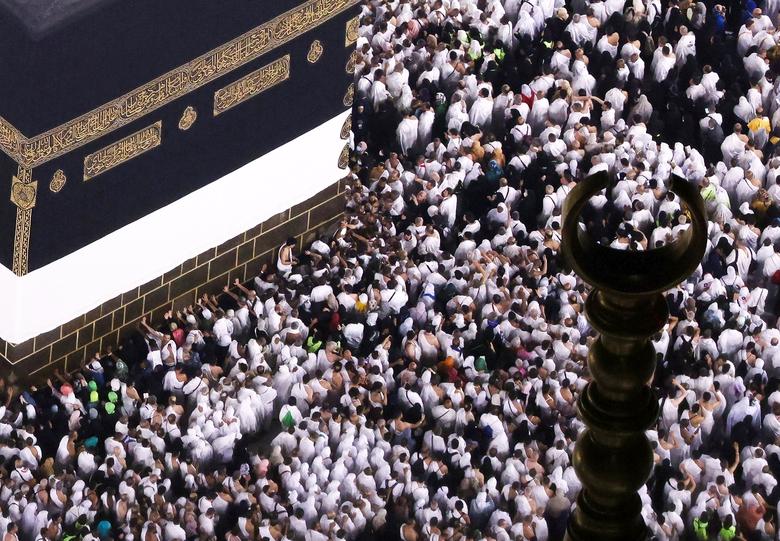 Muslim pilgrims perform the Umrah at the Holy Kaaba, as they start arriving to perform the annual Haj at the Grand Mosque, in the holy city of Mecca, Saudi Arabia, June 25.