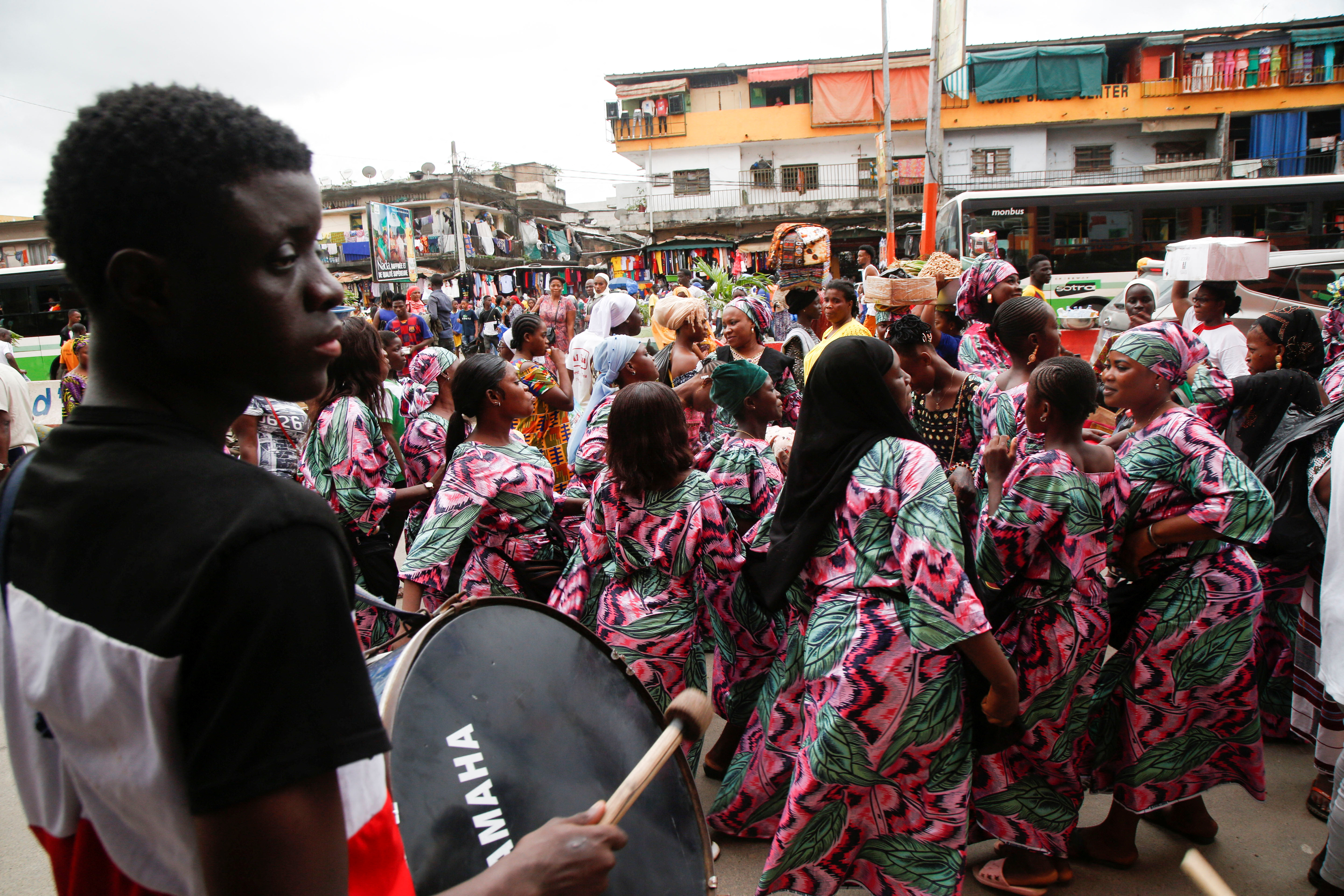 Muslim women dance in the street ahead of Eid al-Adha, in Adjame, Abidjan, Ivory Coast.
