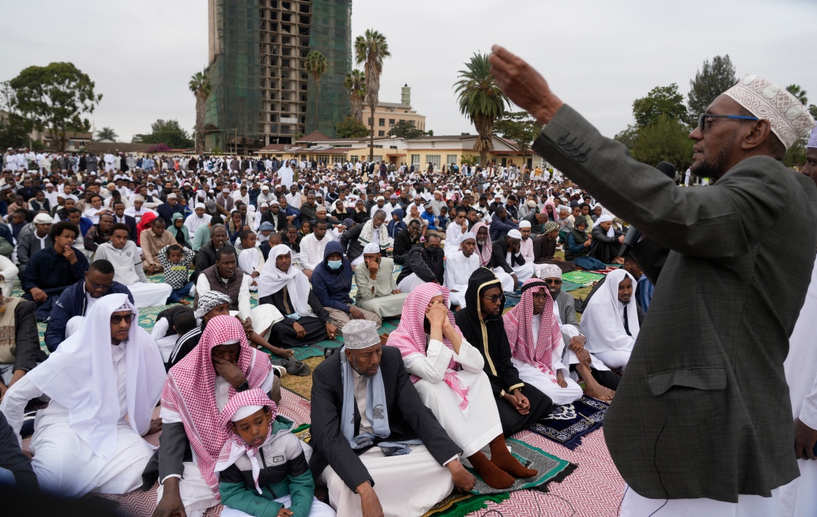 An imam delivers a sermon as Muslims gather for prayers to celebrate Eid al-Adha, or the Feast of Sacrifice, in Nairobi, Kenya.