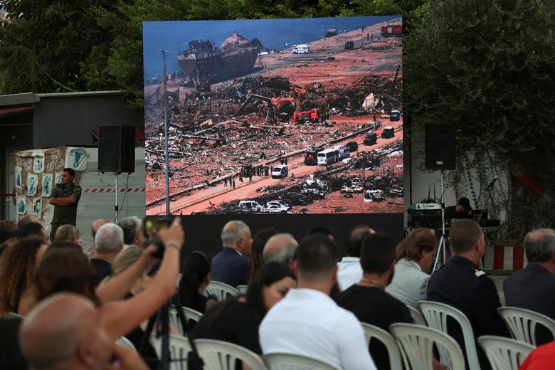 Families and relatives of firefighters who were killed during the August 2020 Beirut port blast attend a memorial ceremony at the fire station in Beirut, Lebanon, August 2.