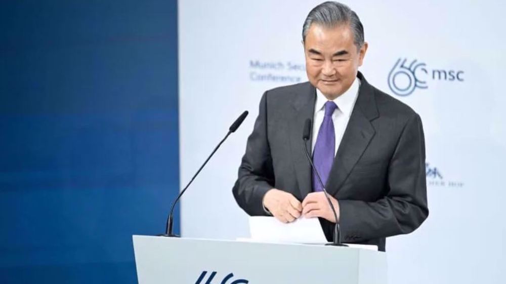 Chinese Foreign Minister Wang Yi delivers a speech at the 60th Munich Security Conference in Germany