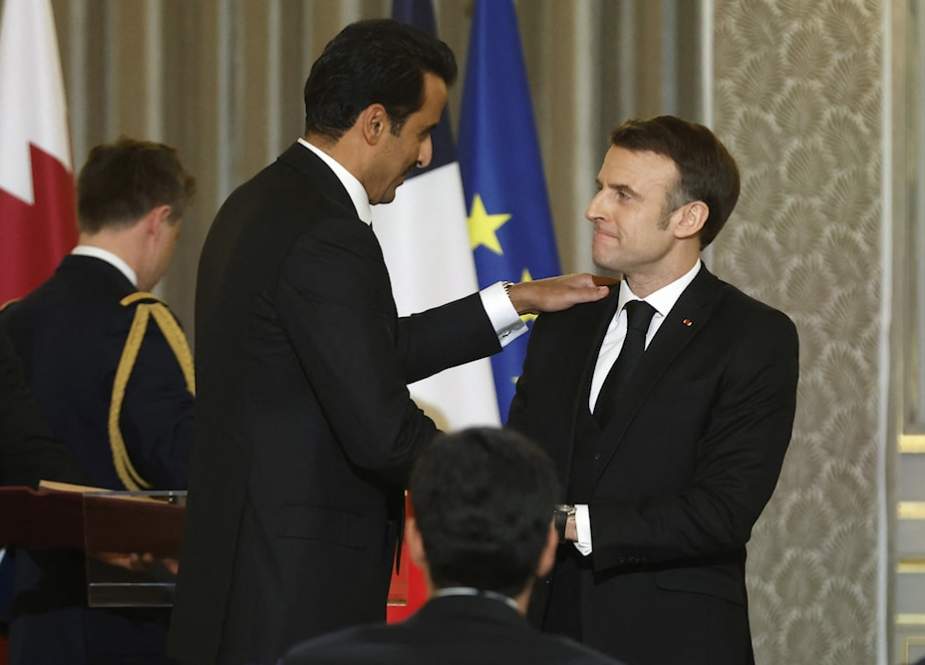 Qatari Emir Tamim Bin Hamad al-Thani and French President Emanuel Macron