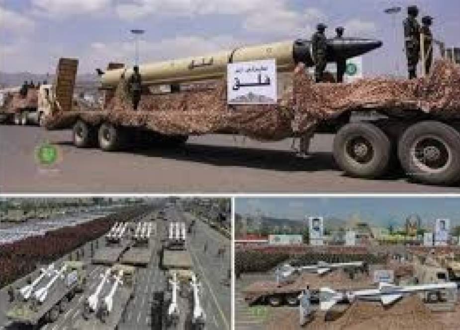 Yemeni forces show ballistic missiles in a parade.