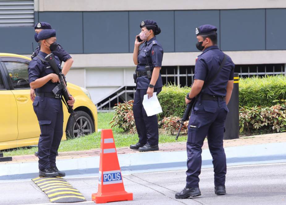 Police officers are seen in Kuala Lumpur, Malaysia