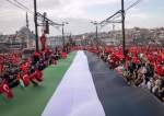 Thousands demonstrate to show solidarity with the Palestinian people in Gaza at the Galata Bridge in Istanbul