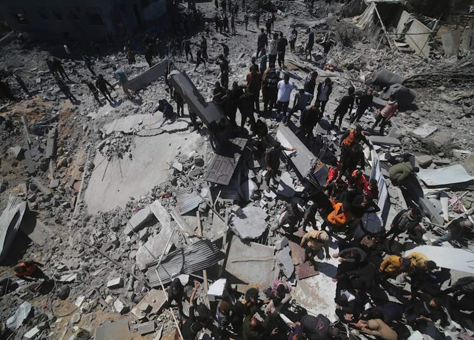 Palestinian residental building destroyed in an strike on Rafah, Gaza Strip