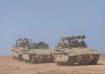 Israeli force drive APC near Gaza Strip
