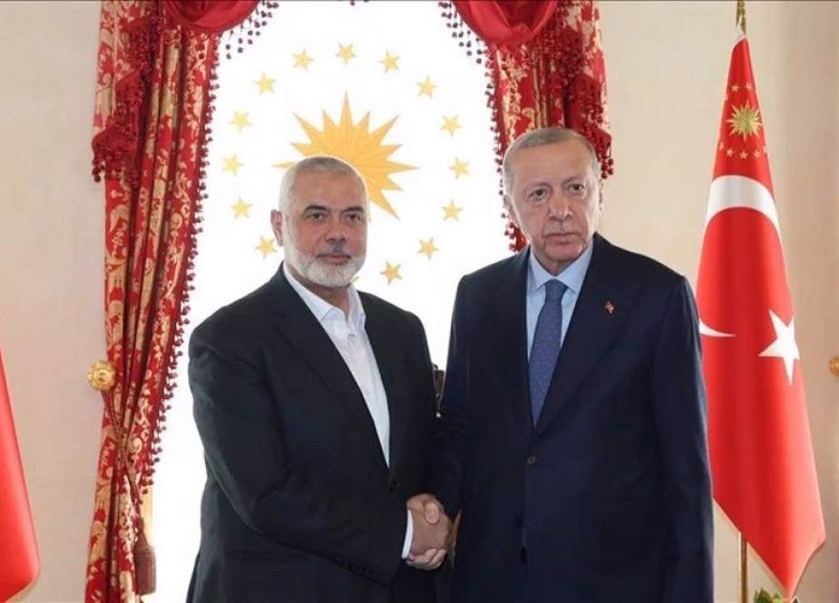 Turkish President Recep Tayyip Erdogan with Hamas Political Bureau Chairman Ismail Haniyeh at Dolmabahce Palace working office in Istanbul, Turkey