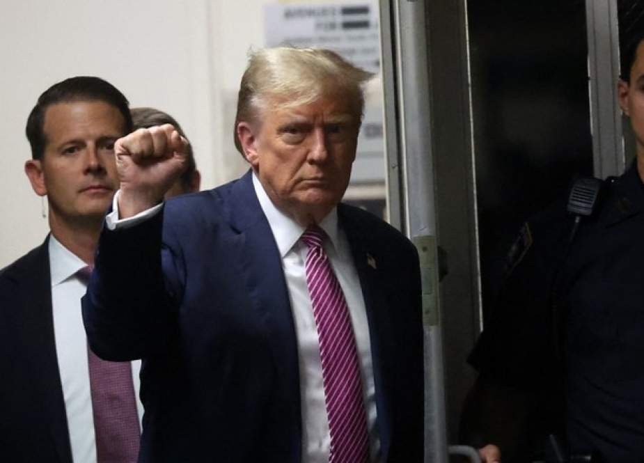 Donald Trump enters Manhattan Criminal Court in New York City