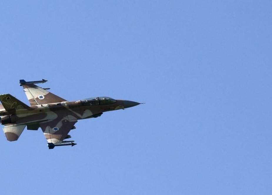 An Israeli Air Force fighter jet flies over the border area with south Lebanon