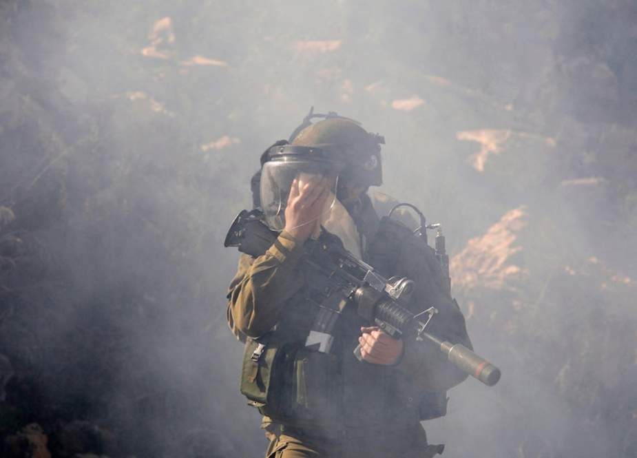 IOF troops during clashes with Palestinians protesters