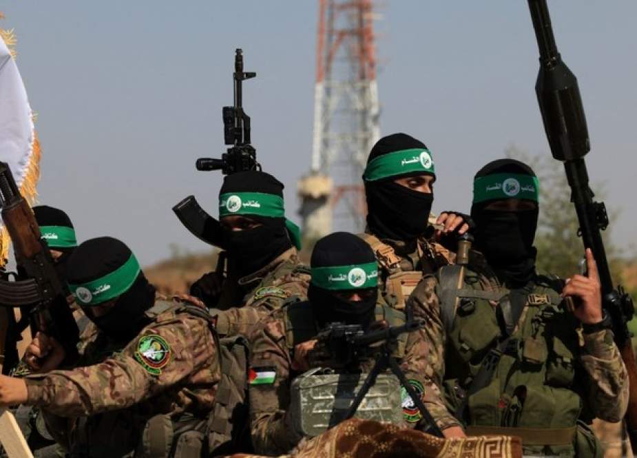 Palestinian fighters of the al-Qassam Brigades, the armed wing of the Hamas movement