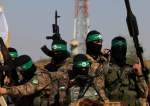 Palestinian fighters of the al-Qassam Brigades, the armed wing of the Hamas movement