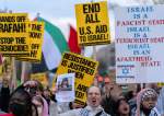Demonstrators march to the White House in support of Palestinians