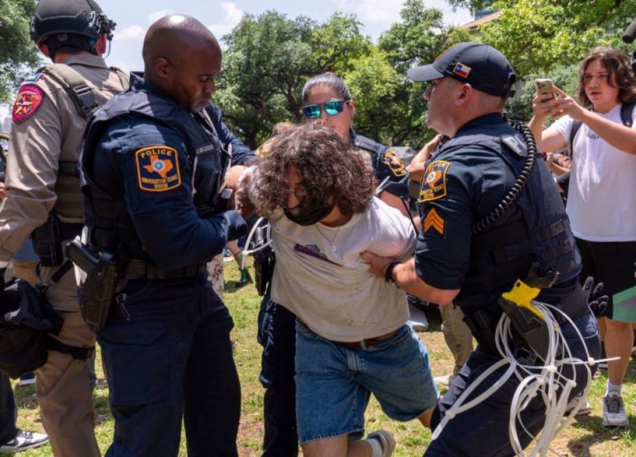 Texas policemen arrest a pro-Palestinian demonstrator at the University of Texas in Austin, Texas