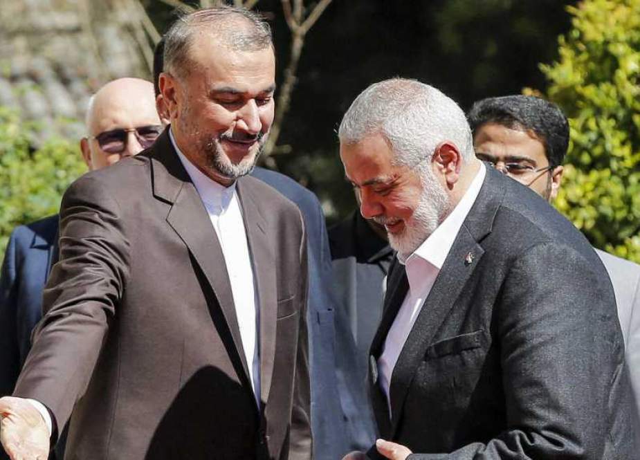 Iranian Foreign Minister Hossein AmirAbdollahian with Hamas chief Ismail Haniyeh