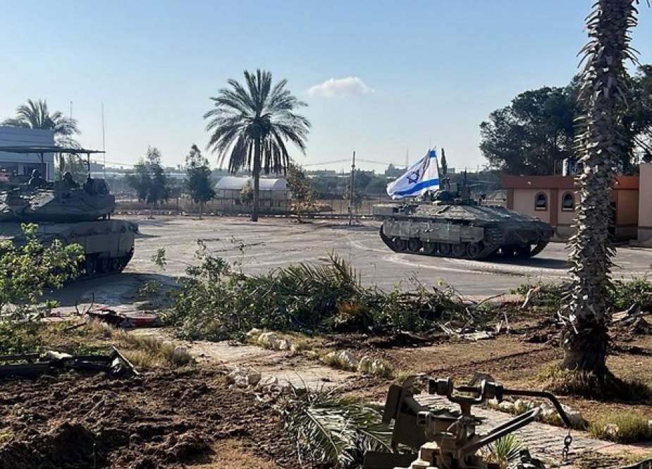 Israeli tanks enter the Palestinian side of the Rafah border crossing in Gaza