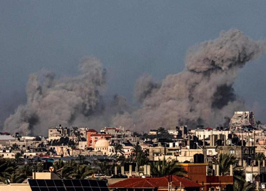 Smoke billowing over the southern Gaza Strip during Israeli bombardmen