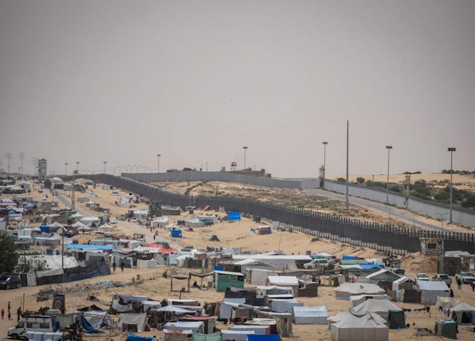 Palestinians displaced at tent camp in Rafah, on the border with Egypt, Gaza