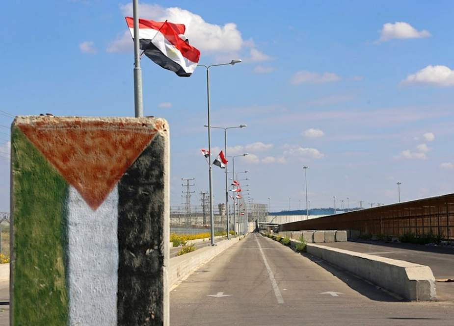 Egyptian flags fly at the passageway leading to the Palestinian side of the Erez checkpoint with Gaza, at Beit Hanoun, Gaza Strip