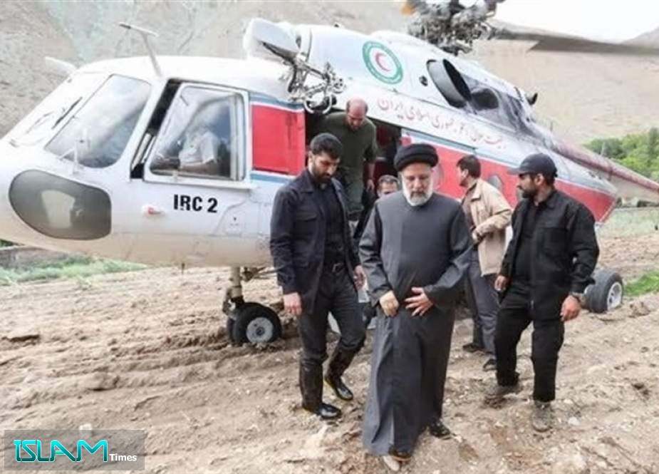 The file photo taken by the Iranian Presidential Office shows President Ebrahim Raisi visiting Firoozkouh after floods on July 31, 2022.