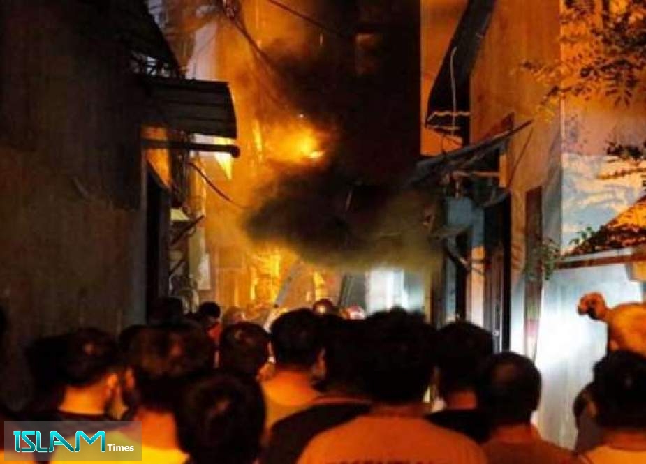 مقتل 14 شخصاً على الأقلّ في حريق بمبنى في وسط هانوي