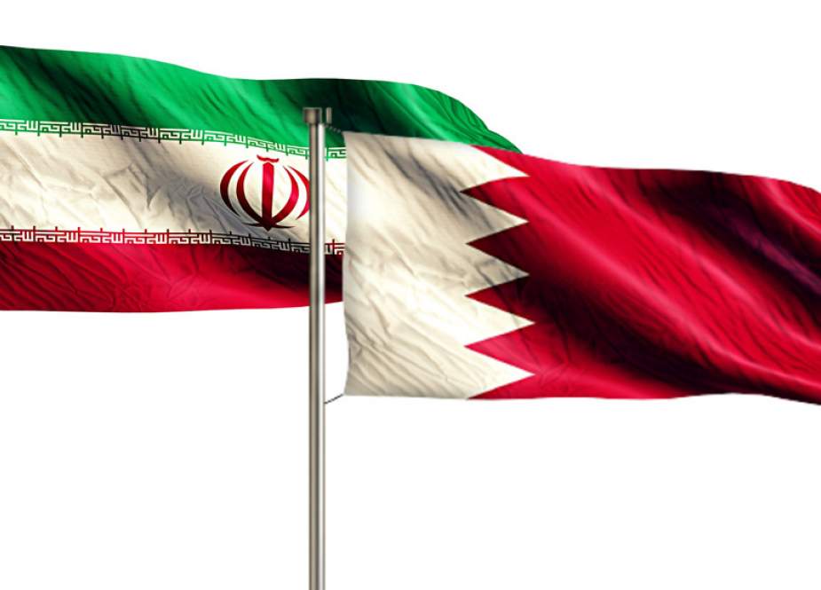 The national flags of the Islamic Republic of Iran and Bahrain.